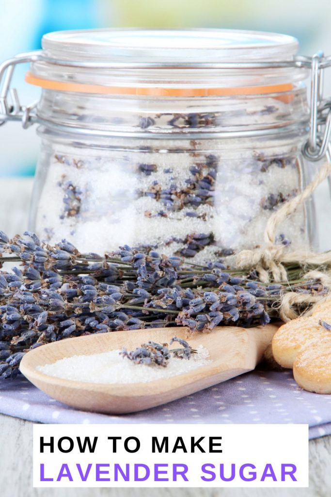 lavender infused sugar in a jar with dried lavender and wooden spoon and text overlaly 'How to Make Lavender Sugar'