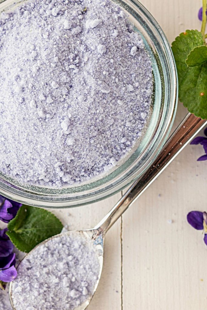 closeup of lavender sugar in a glass jar